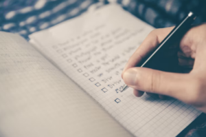 Client writing what to talk about in the therapy session